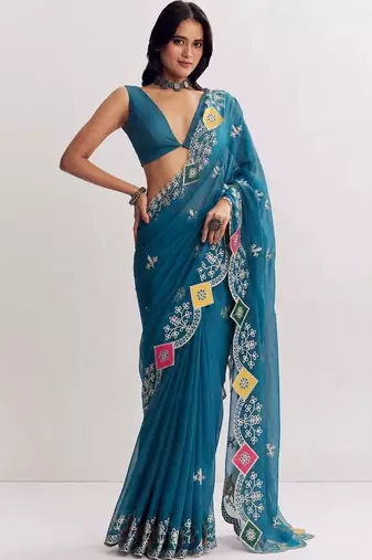 Teal ethnic motifs embroidered satin designer saree