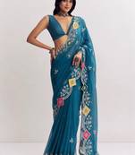 Teal ethnic motifs embroidered satin designer saree