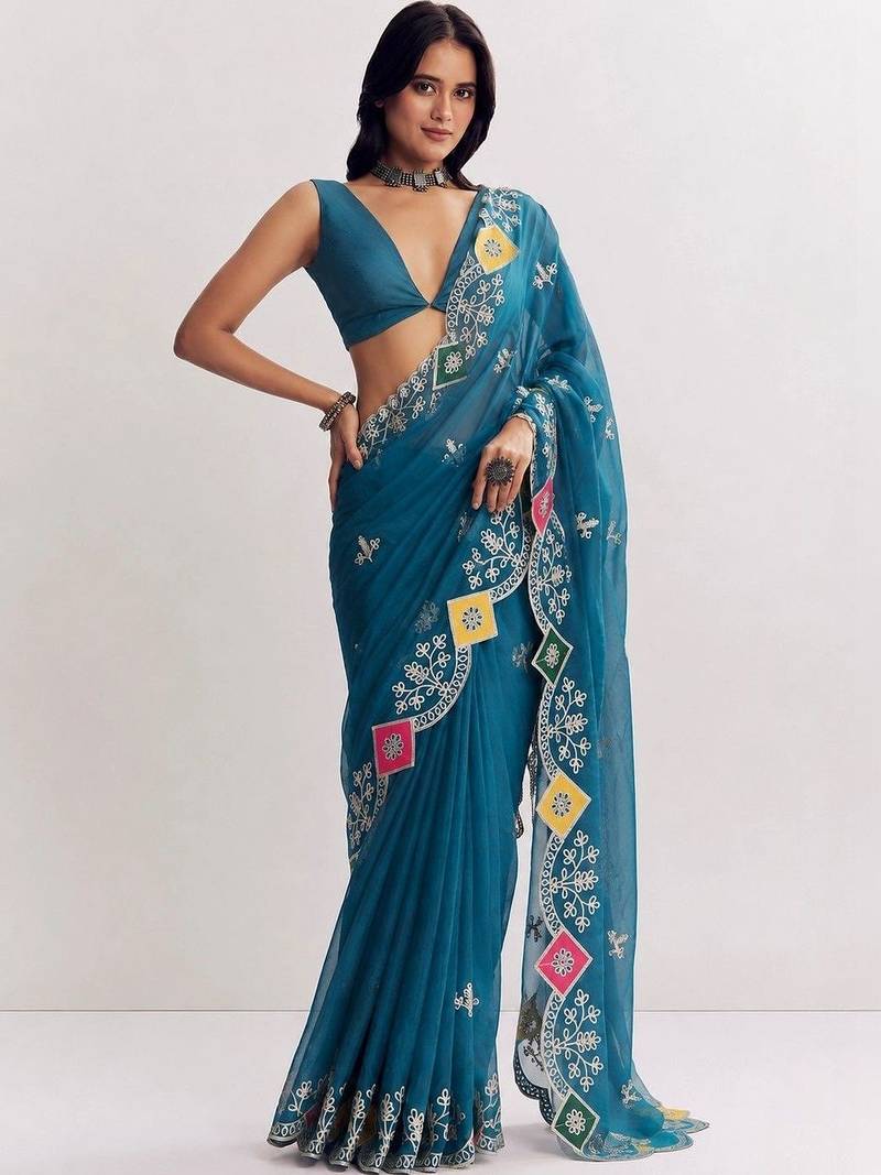 Teal ethnic motifs embroidered satin designer saree