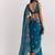 Teal ethnic motifs embroidered satin designer saree