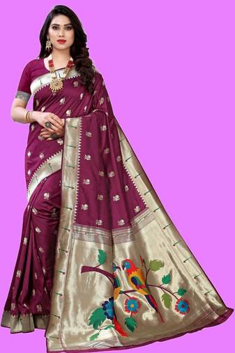 Purple purple paithani woven design saree and has a zari border blouse piece