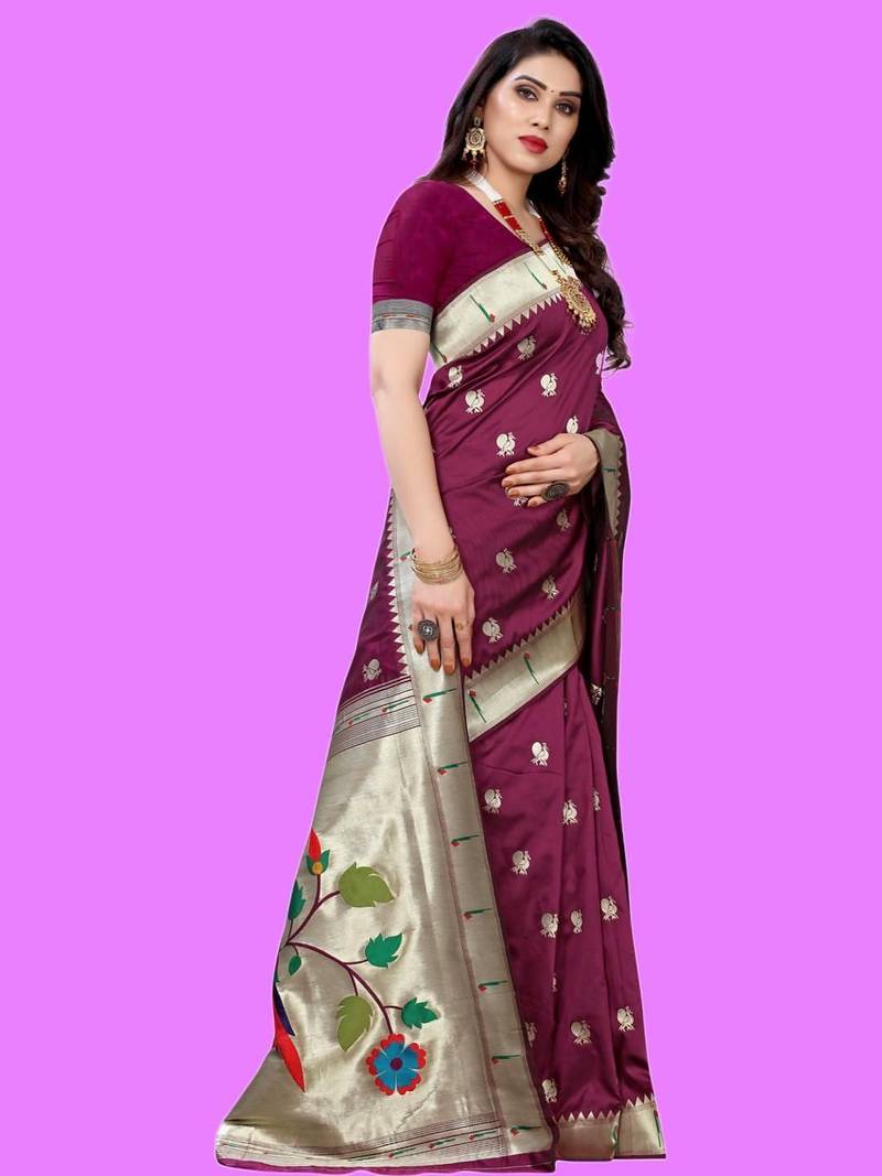 Purple purple paithani woven design saree and has a zari border blouse piece