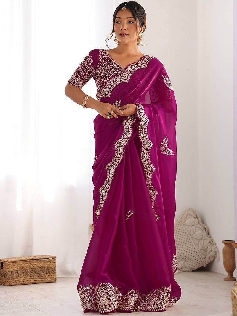 Magenta embellished sequinned tissue saree with blouse piece