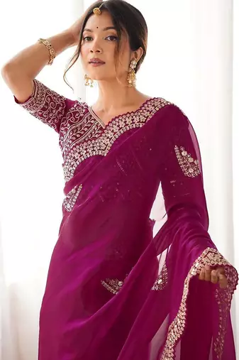 Magenta embellished sequinned tissue saree with blouse piece