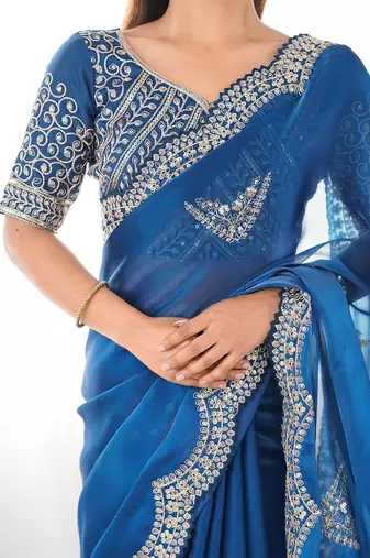 Blue ethnic motifs embroidered sequinned tissue saree with unstiched blouse piece