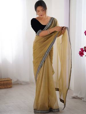 Mustard embroidered sequinned border net saree 1