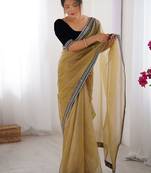 Mustard embroidered sequinned border net saree