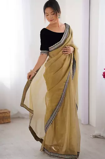 Mustard embroidered sequinned border net saree
