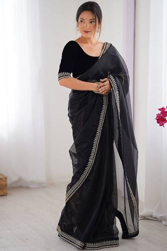Black floral embroidered sequinned net saree