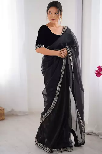 Black floral embroidered sequinned net saree