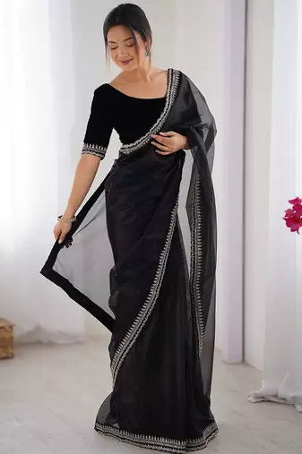 Black floral embroidered sequinned net saree