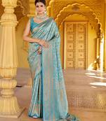 Sea green ethnic motifs woven design zari saree