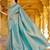 Sea green ethnic motifs woven design zari saree