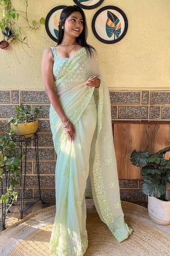 Green embroidered georgette  sequinned crush saree with blouse piece