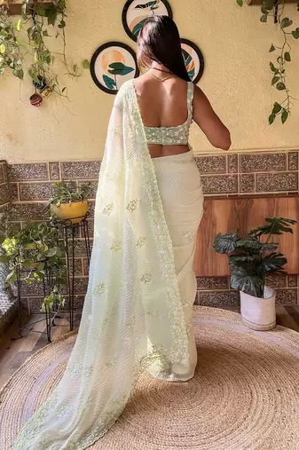 Green embroidered georgette  sequinned crush saree with blouse piece