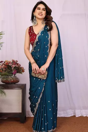 Teal embellished embroidered silk blend heavy work saree