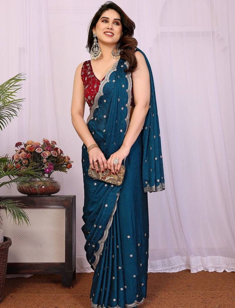 Teal embellished embroidered silk blend heavy work saree