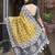 Yellow batik printed zari chanderi saree