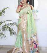 Green woven design zari paithani saree with unstitched blouse piece