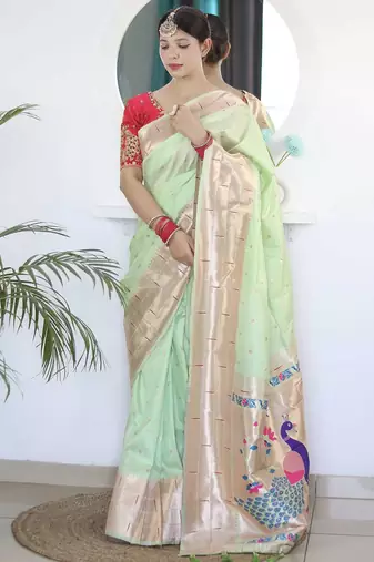 Green woven design zari paithani saree with unstitched blouse piece