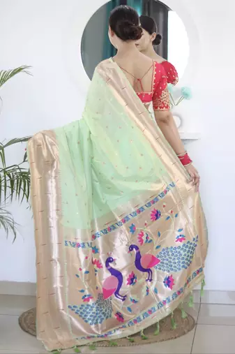 Green woven design zari paithani saree with unstitched blouse piece