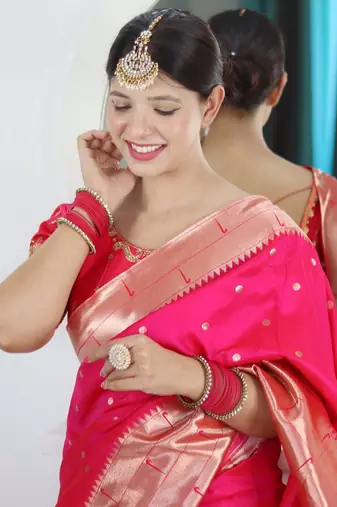 Pink ethnic motifs woven design paithani silk saree with unstitched blouse piece