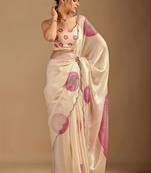 Cream polka dot embroidered organza saree