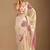 Cream polka dot embroidered organza saree