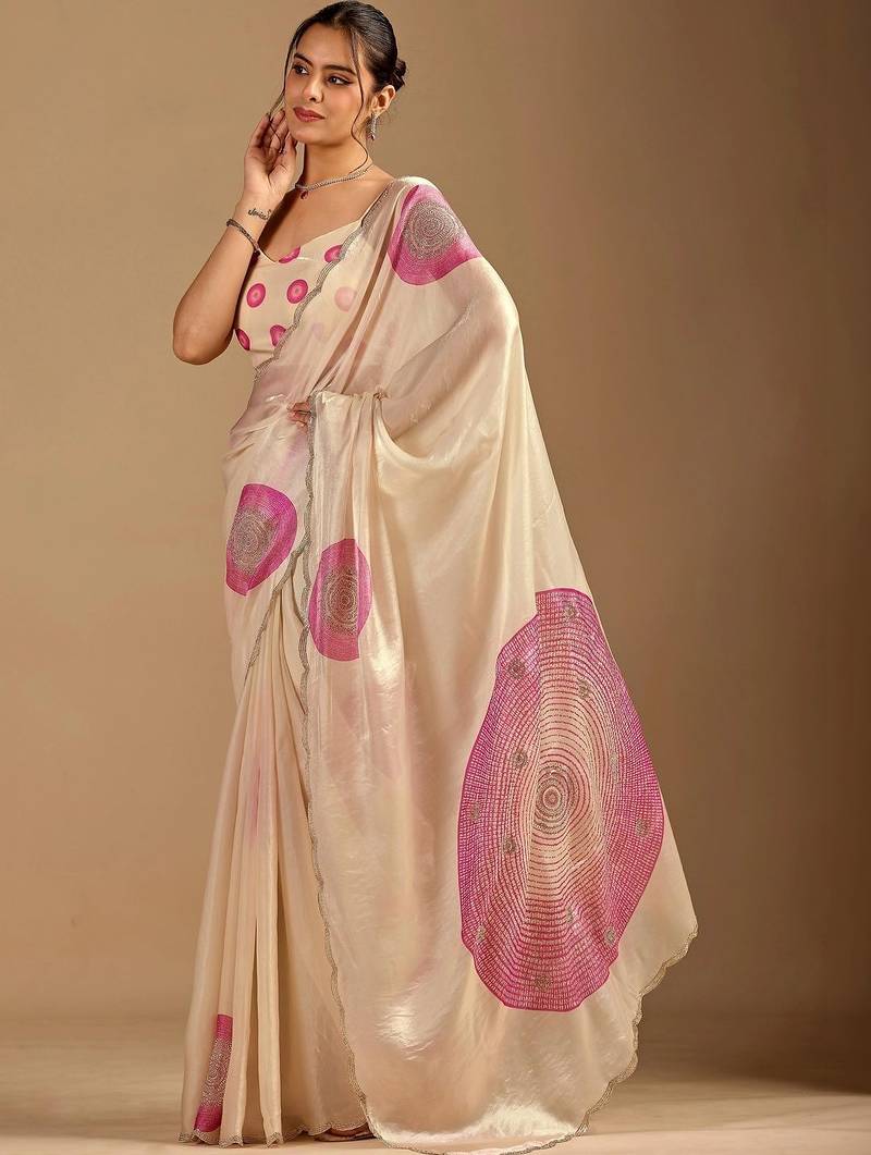 Cream polka dot embroidered organza saree