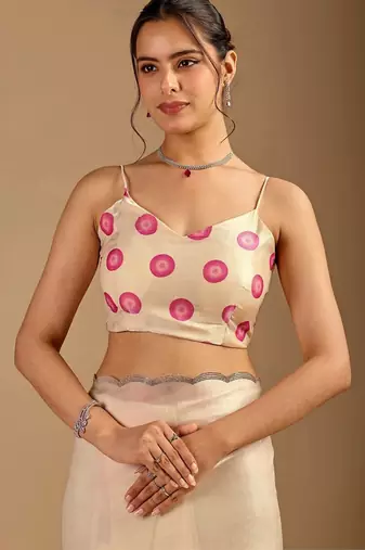 Cream polka dot embroidered organza saree