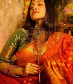 Red floral silk blend banarasi saree