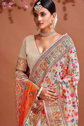 White ethnic motifs woven design zari saree
