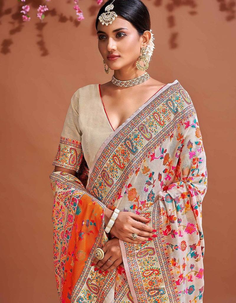 White ethnic motifs woven design zari saree
