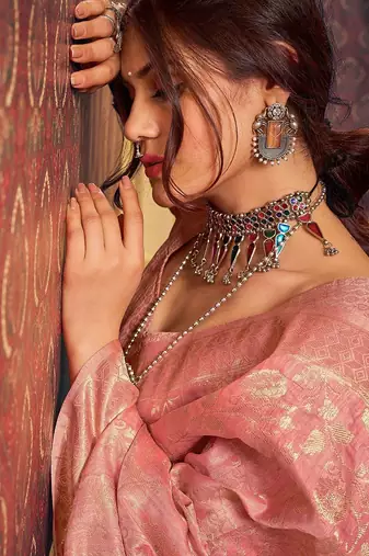 Peach ethnic motifs woven design zari saree