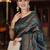Teal woven design zari silk blend banarasi saree