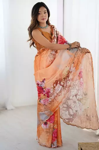 Orange floral printed mirror work saree