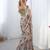 Beige ethnic motifs printed mirror work saree