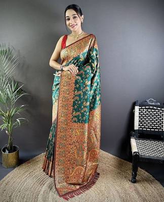 Green ethnic motifs woven design zari banarasi saree 1