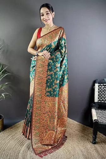 Green ethnic motifs woven design zari banarasi saree