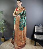 Green ethnic motifs woven design zari banarasi saree