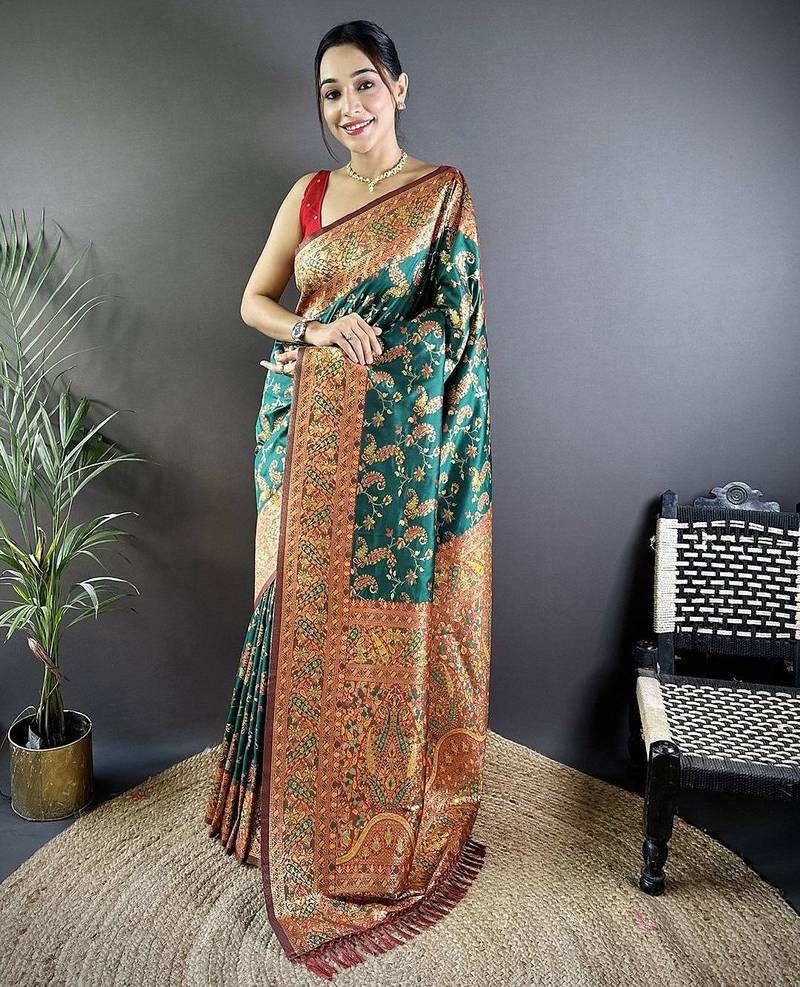 Green ethnic motifs woven design zari banarasi saree