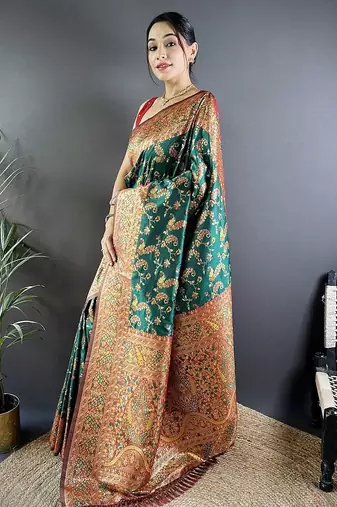 Green ethnic motifs woven design zari banarasi saree