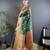 Green ethnic motifs woven design zari banarasi saree