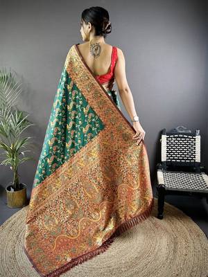 Green ethnic motifs woven design zari banarasi saree 3