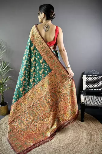 Green ethnic motifs woven design zari banarasi saree
