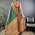 Green ethnic motifs woven design zari banarasi saree