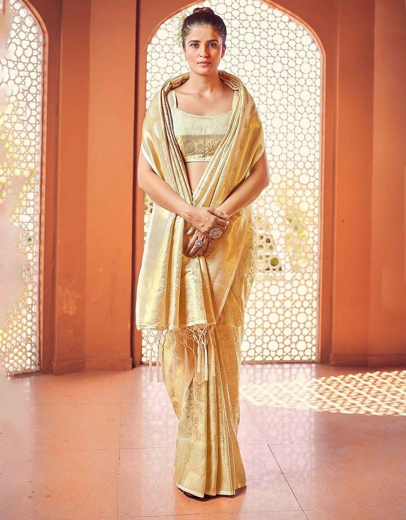 White ethnic motifs woven design zari saree