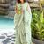 Green floral printed beads and stones saree