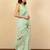 Green floral printed beads and stones saree