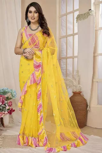 Yellow embellished mirror work net ruffle saree with blouse piece